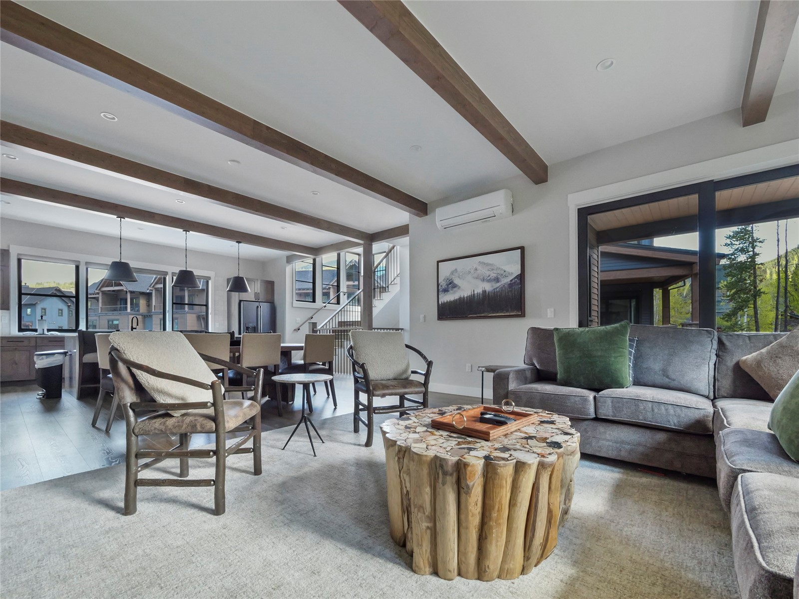 75 Alcove Court, Unit 75 Keystone, CO 80435 - Photo 11 of 40 a living room with furniture and a large window