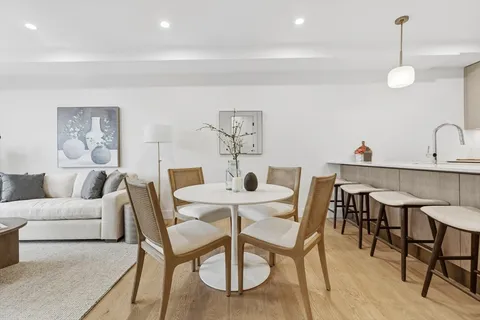 a view of a dining room with furniture