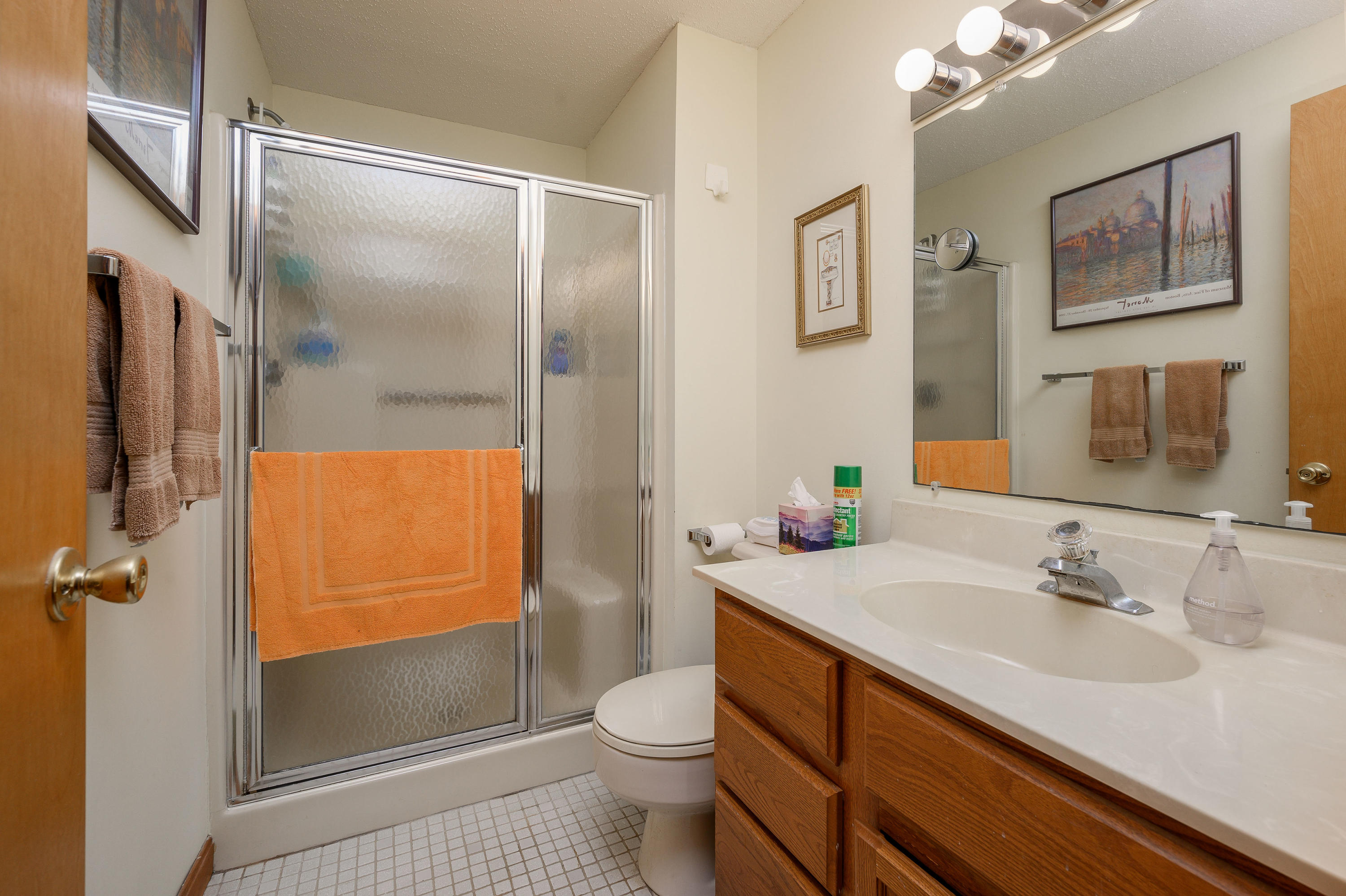 174 Lowell Road, Unit N102 Mashpee, MA 02649 - Photo 21 of 35 a bathroom with a sink a toilet and shower