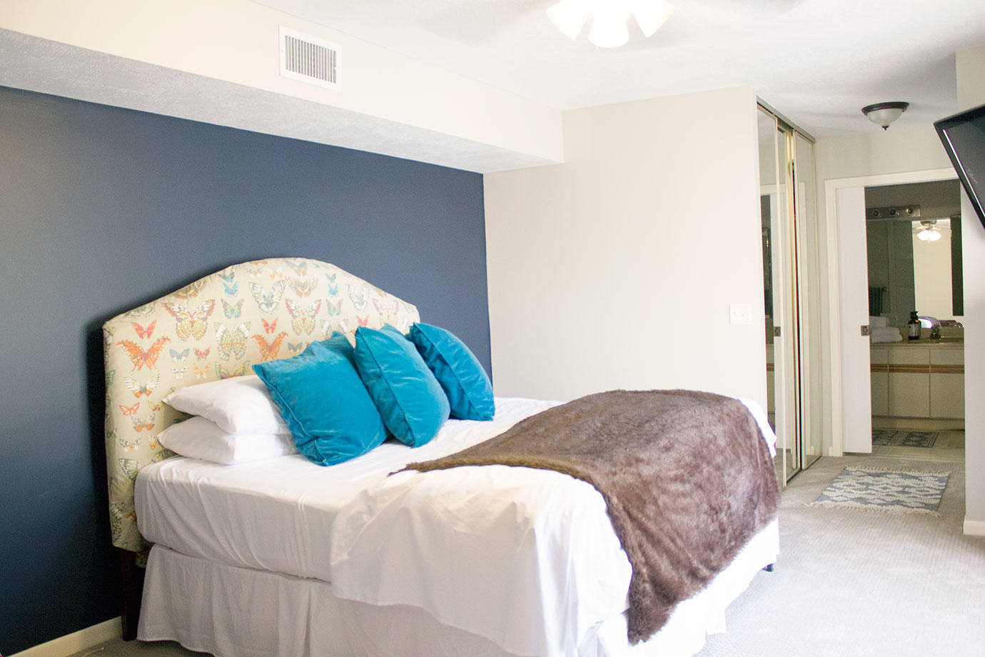 8265 Boca Rio Drive Boca Raton, FL 33433 - Photo 11 of 18 a bedroom with a bed and a view of bathroom