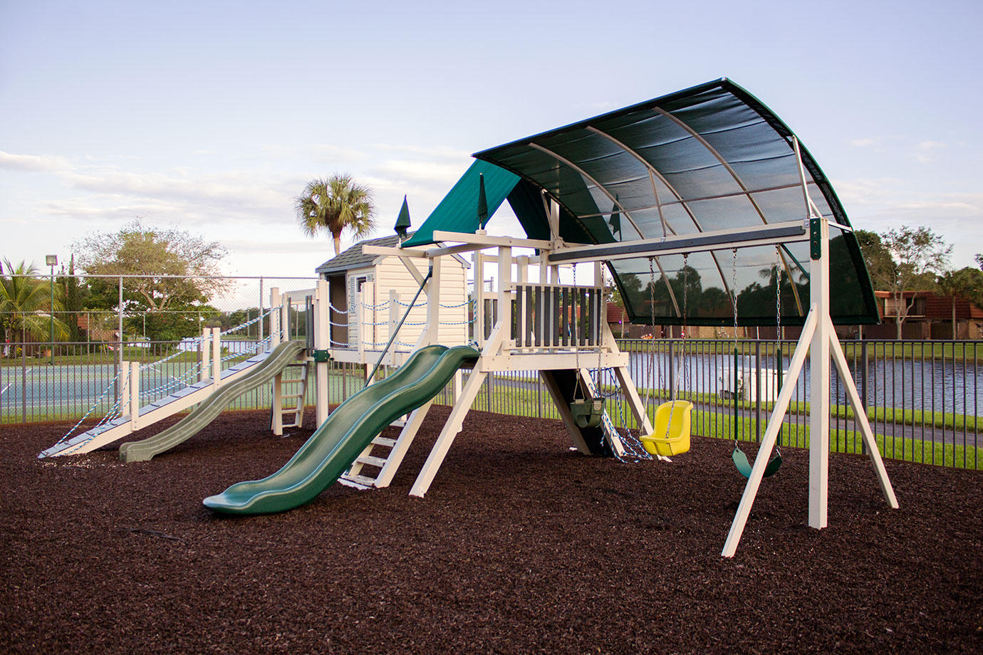 8265 Boca Rio Drive Boca Raton, FL 33433 - Photo 15 of 18 a view of a park with a slide