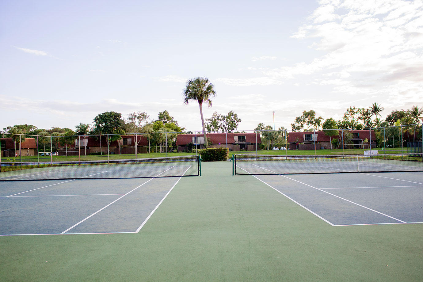 8265 Boca Rio Drive Boca Raton, FL 33433 - Photo 17 of 18 a view of a tennis court