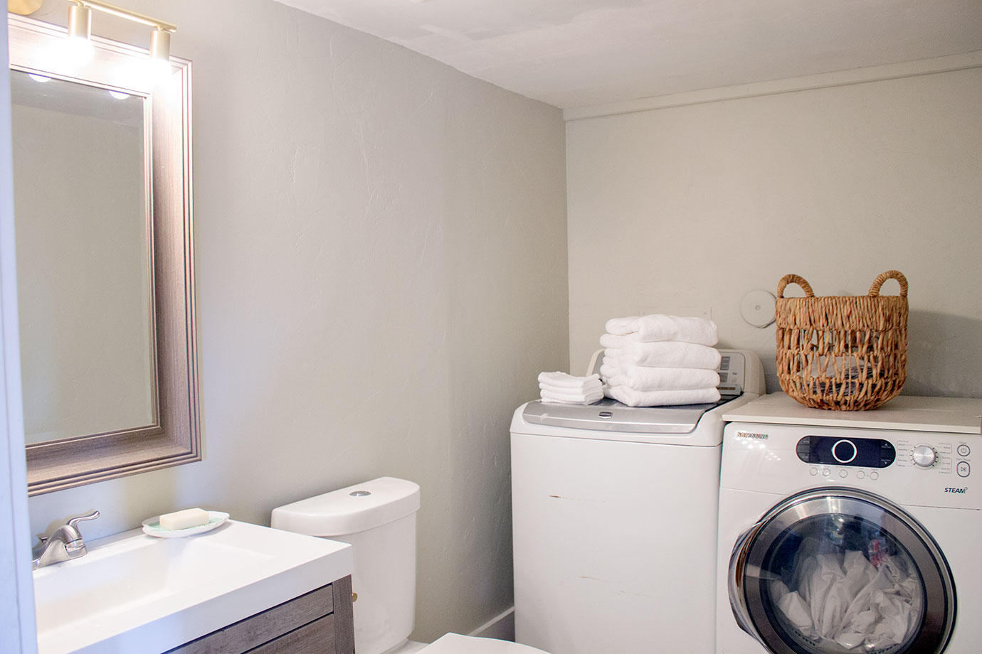 8265 Boca Rio Drive Boca Raton, FL 33433 - Photo 7 of 18 a utility room with dryer and washer
