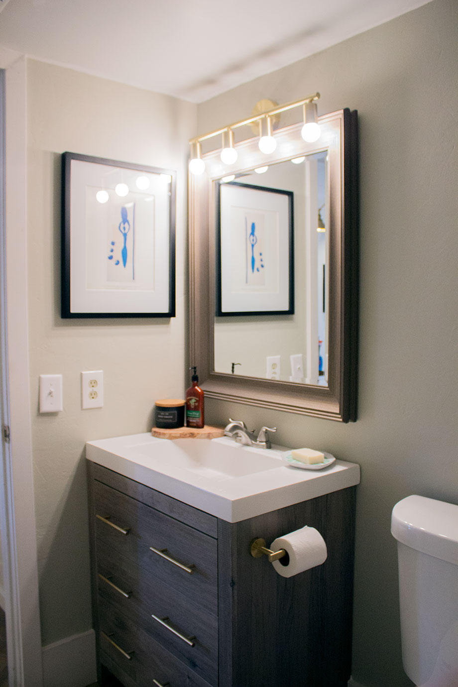 8265 Boca Rio Drive Boca Raton, FL 33433 - Photo 9 of 18 a bathroom with a sink mirror and toilet