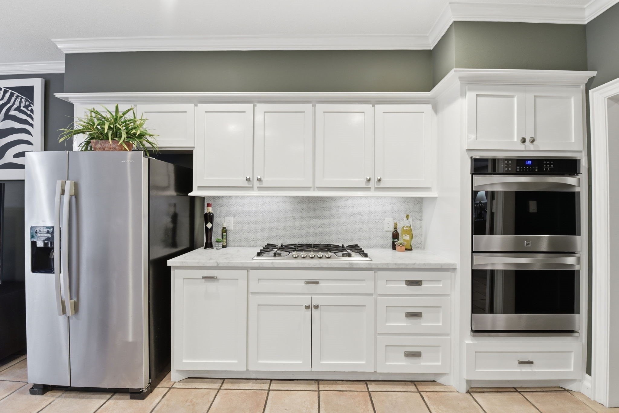 16322 Cranwood Drive Spring, TX 77379 - Photo 22 of 42 This kitchen features a sleek gas range with ample prep space and abundant cabinet storage, perfect for culinary enthusiasts.