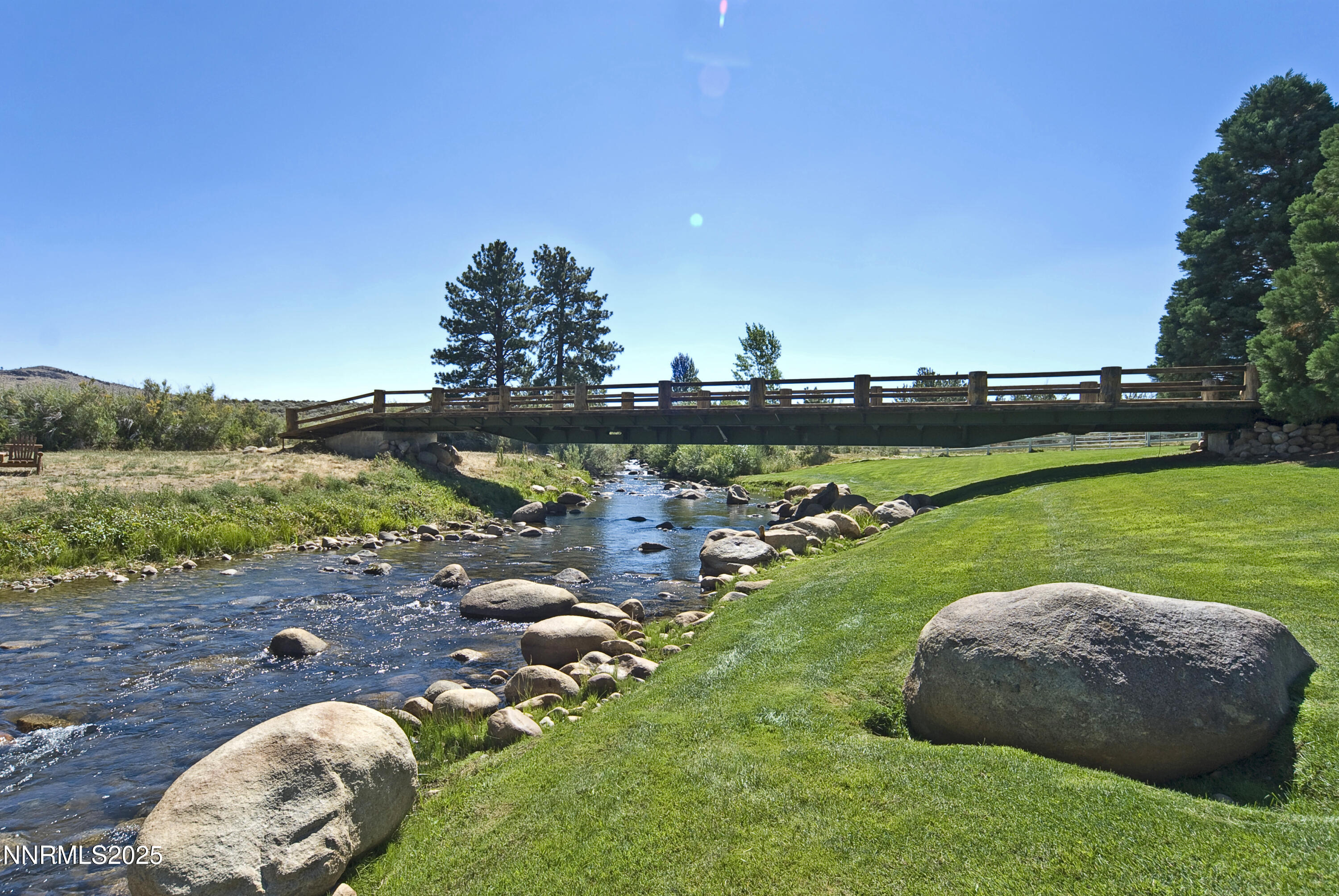 827 River Ranch Road Markleeville, CA 96120 - Photo 14 of 46 a view of a golf course with chairs