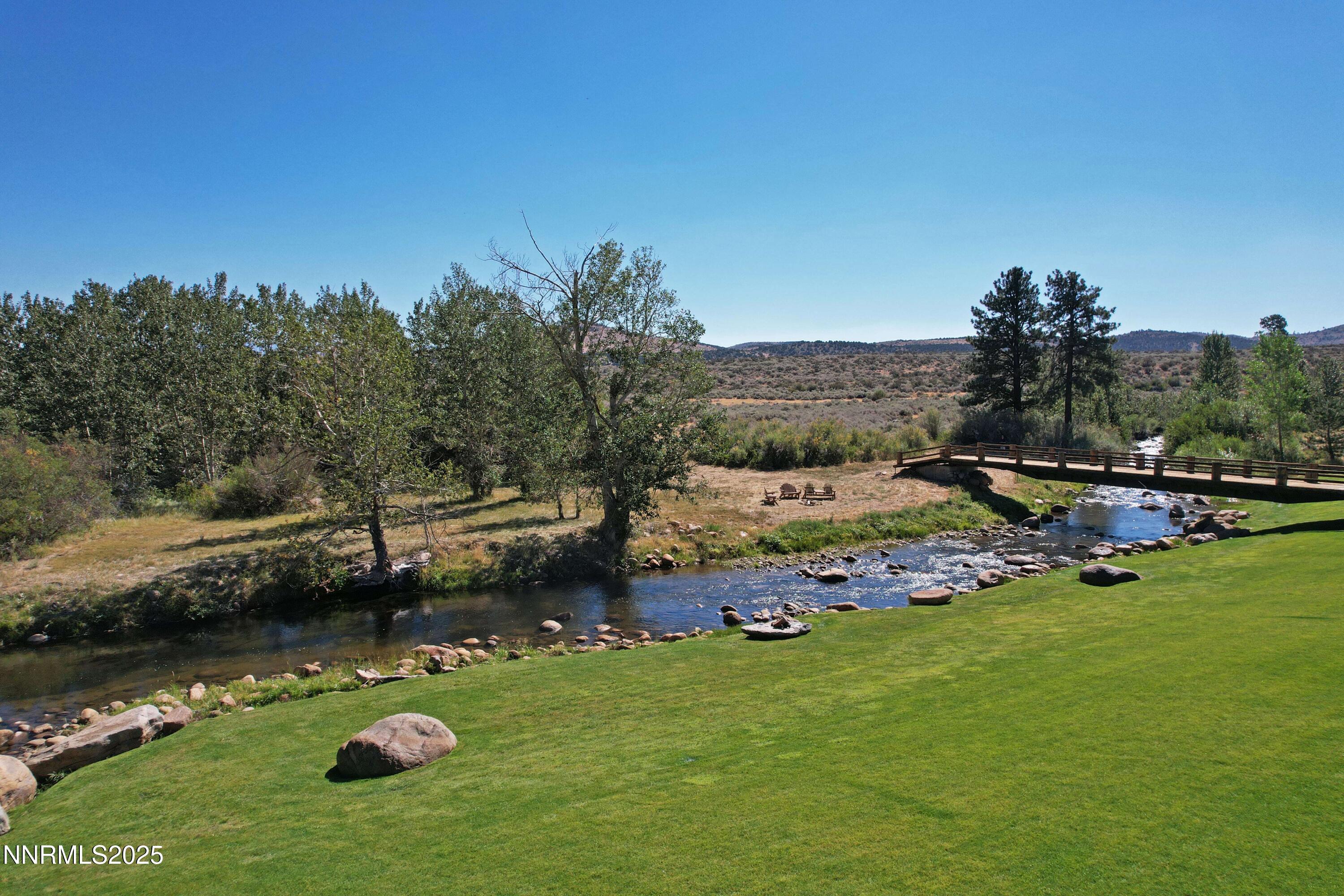 827 River Ranch Road Markleeville, CA 96120 - Photo 15 of 46 a backyard of a house with lots of green space