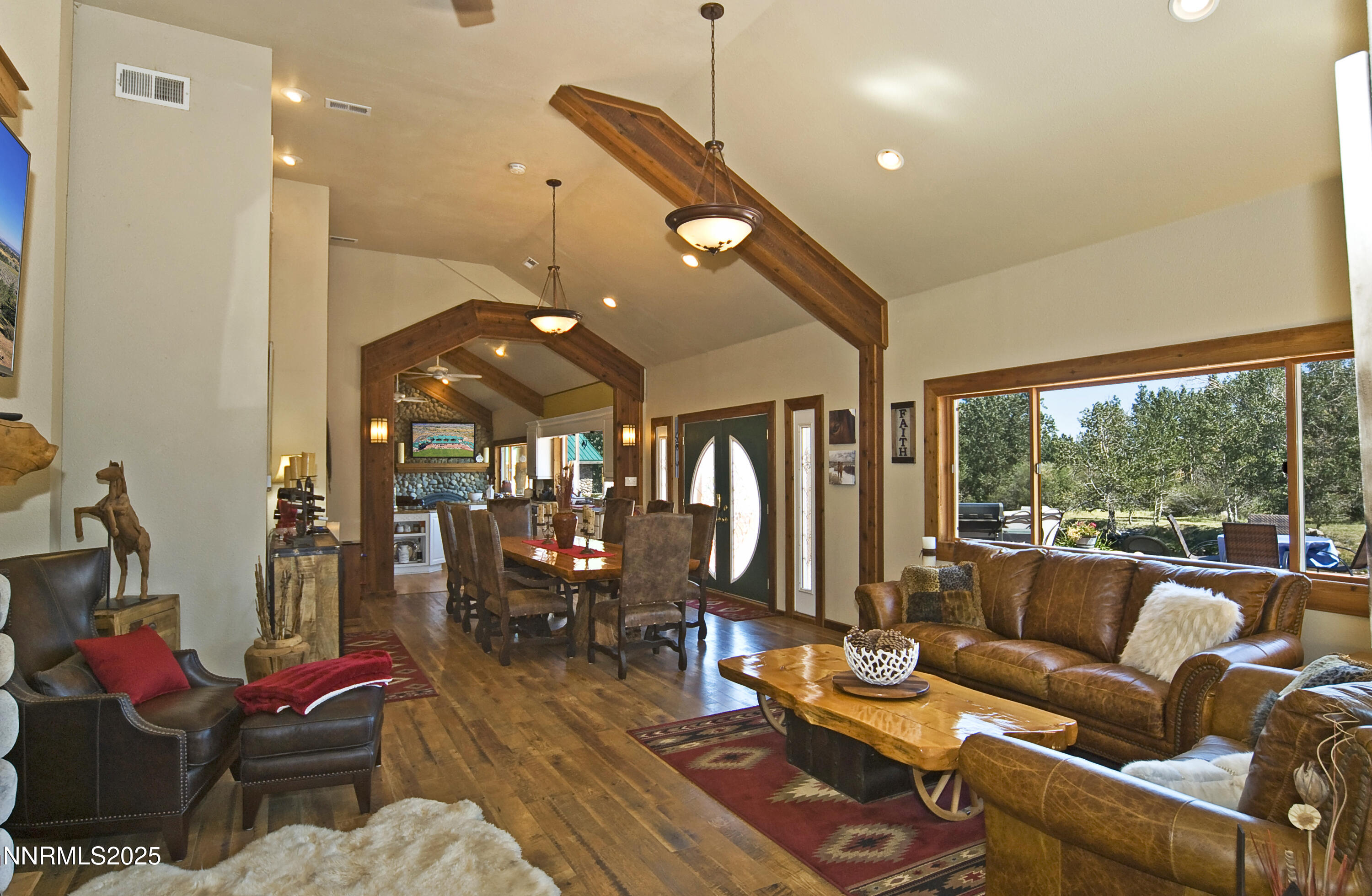 827 River Ranch Road Markleeville, CA 96120 - Photo 18 of 46 a living room with furniture and a large window