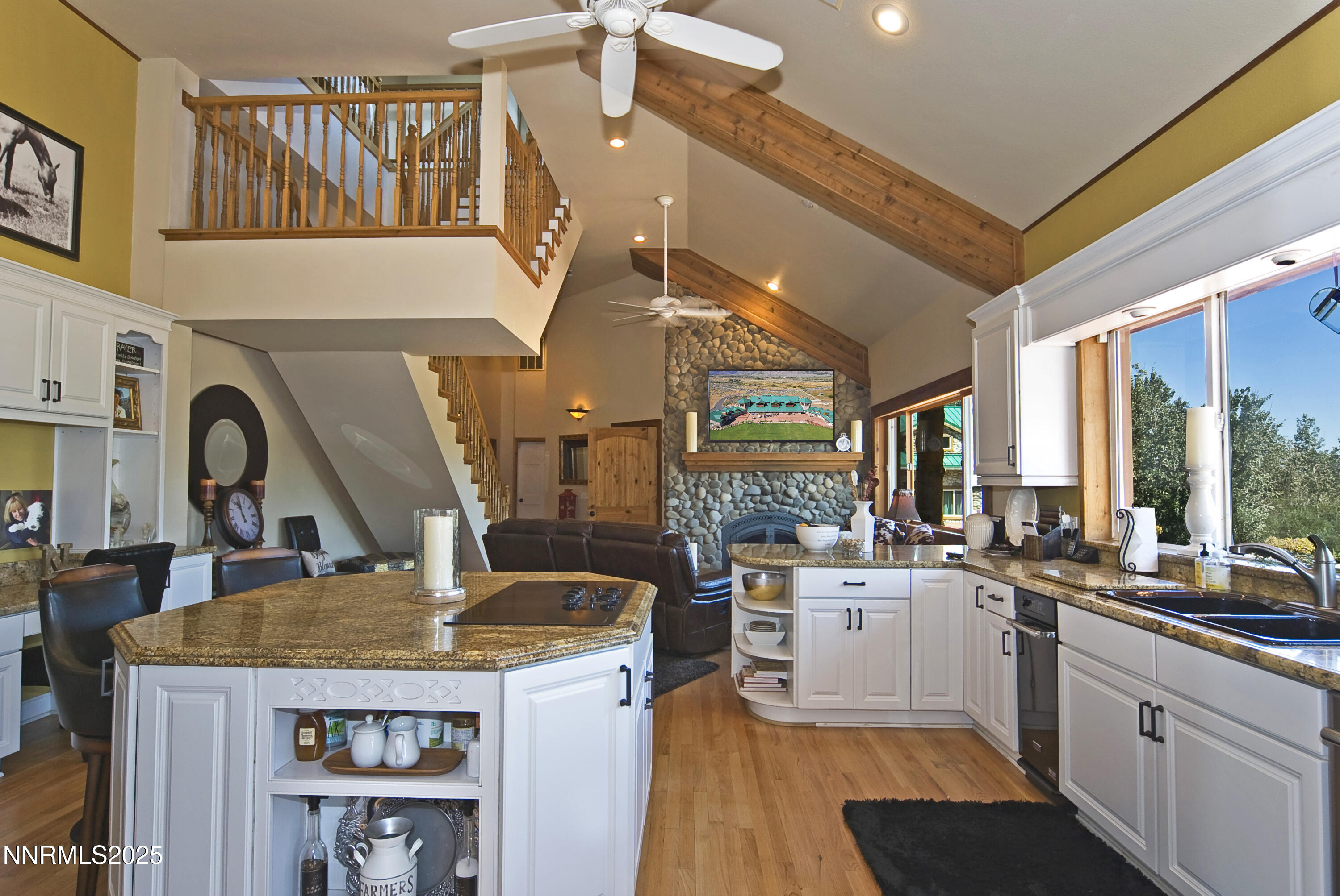 827 River Ranch Road Markleeville, CA 96120 - Photo 20 of 46 a kitchen with a stove a refrigerator and a view of living room