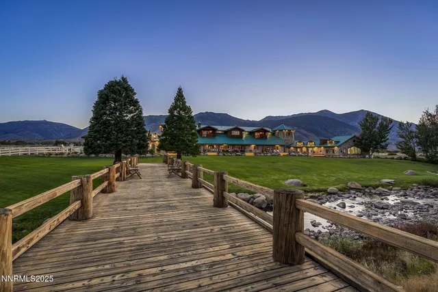 a view of a lake with a yard