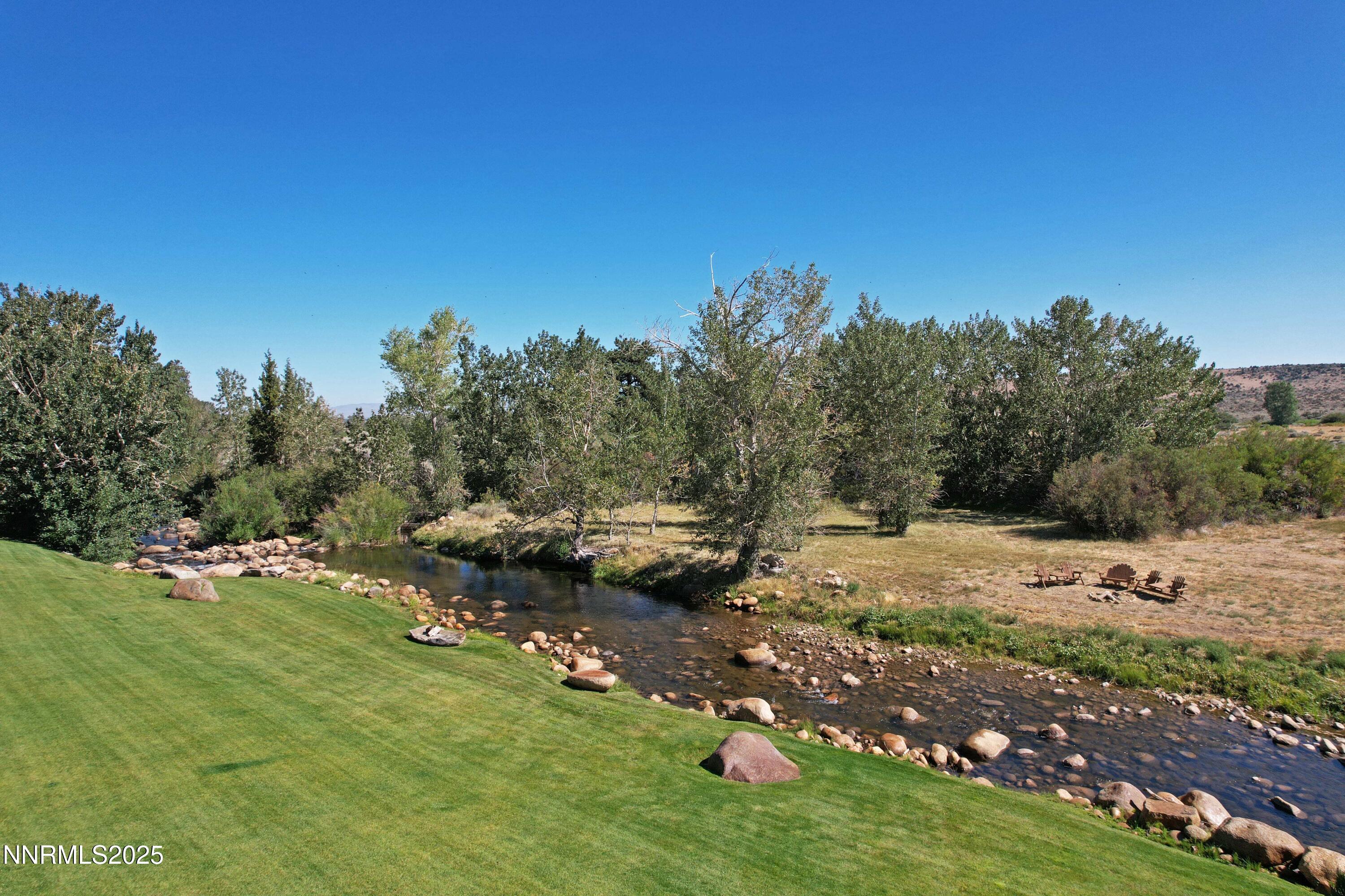 827 River Ranch Road Markleeville, CA 96120 - Photo 41 of 46 a view of a yard with a tree