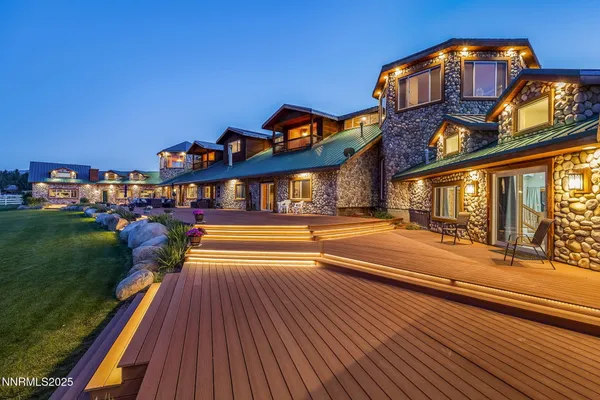 a view of multiple houses with a yard