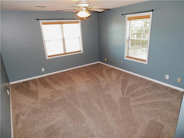4043 Buck Road Clarksville, TN 37043 - Photo 14 of 20 Gorgeous master suite with tons of natural light from two windows and a walk-in closet