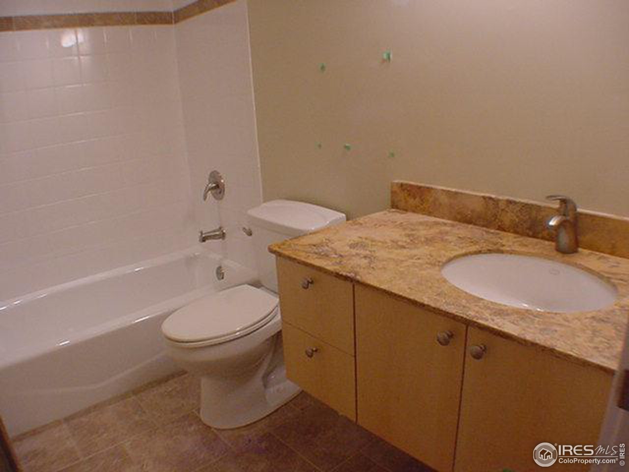 1395 Georgetown Road Boulder, CO 80305 - Photo 12 of 16 a bathroom with a granite countertop sink toilet and shower