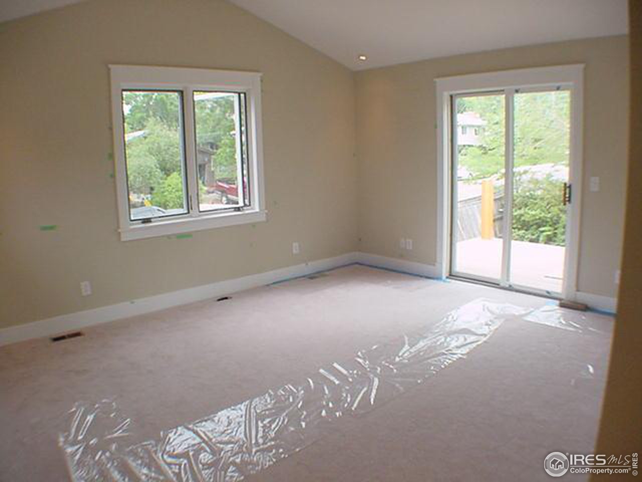 1395 Georgetown Road Boulder, CO 80305 - Photo 15 of 16 a view of a bedroom with windows