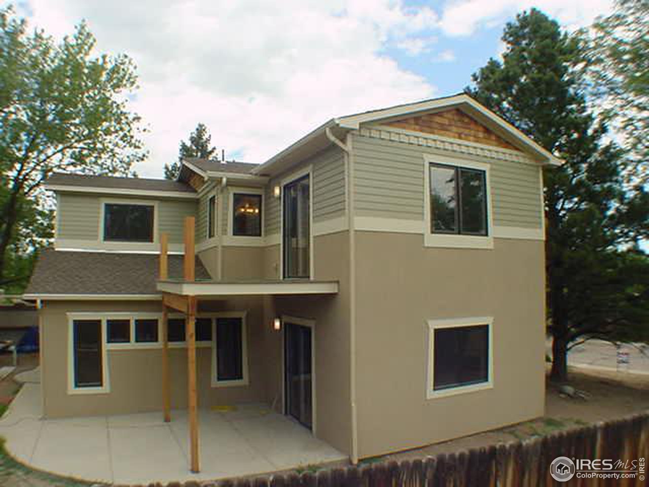1395 Georgetown Road Boulder, CO 80305 - Photo 2 of 16 a front view of a house with a yard