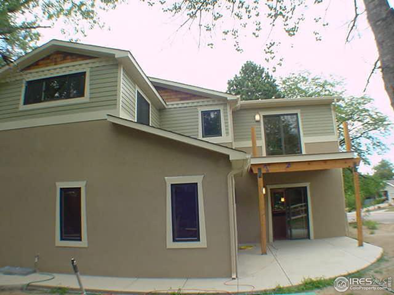 1395 Georgetown Road Boulder, CO 80305 - Photo 4 of 16 a front view of a house with a garage