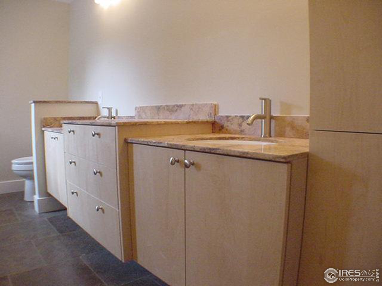 1395 Georgetown Road Boulder, CO 80305 - Photo 9 of 16 a utility room with cabinets washer and dryer