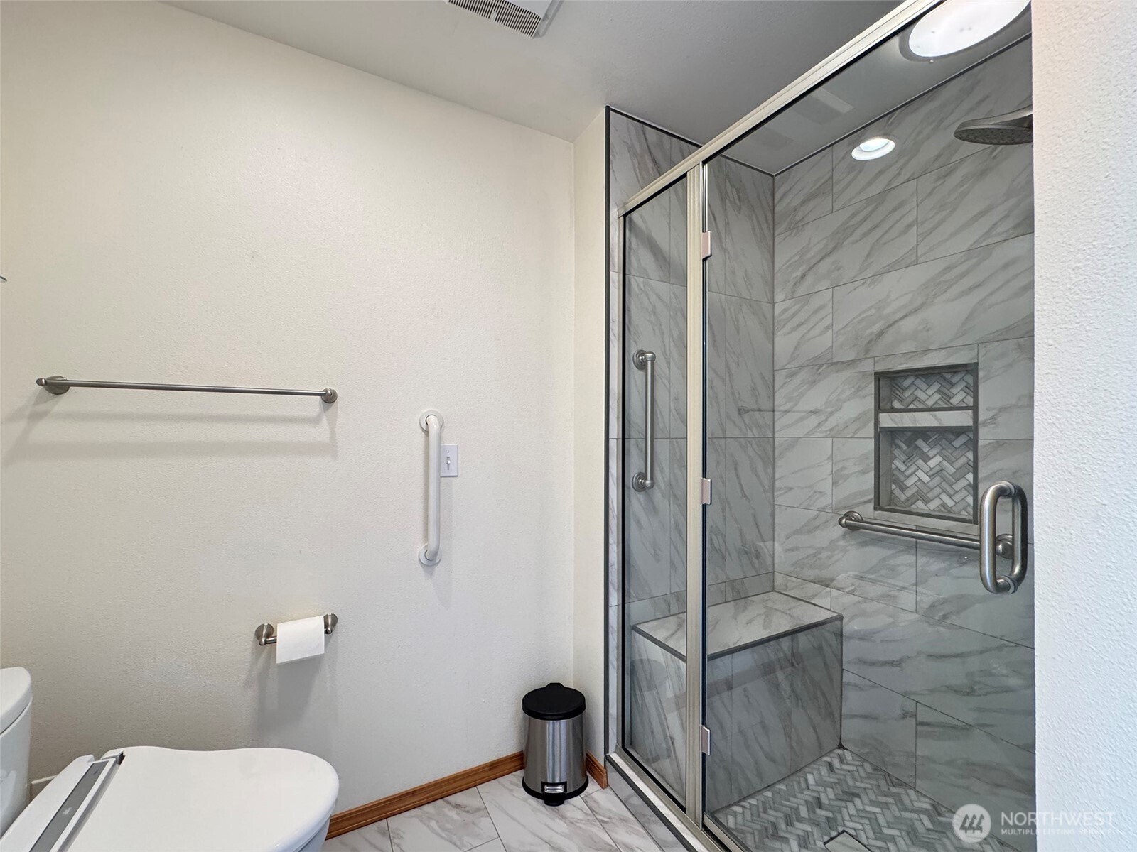 412 Doe Run Road Sequim, WA 98382 - Photo 24 of 40 a bathroom with a shower a toilet and a sink