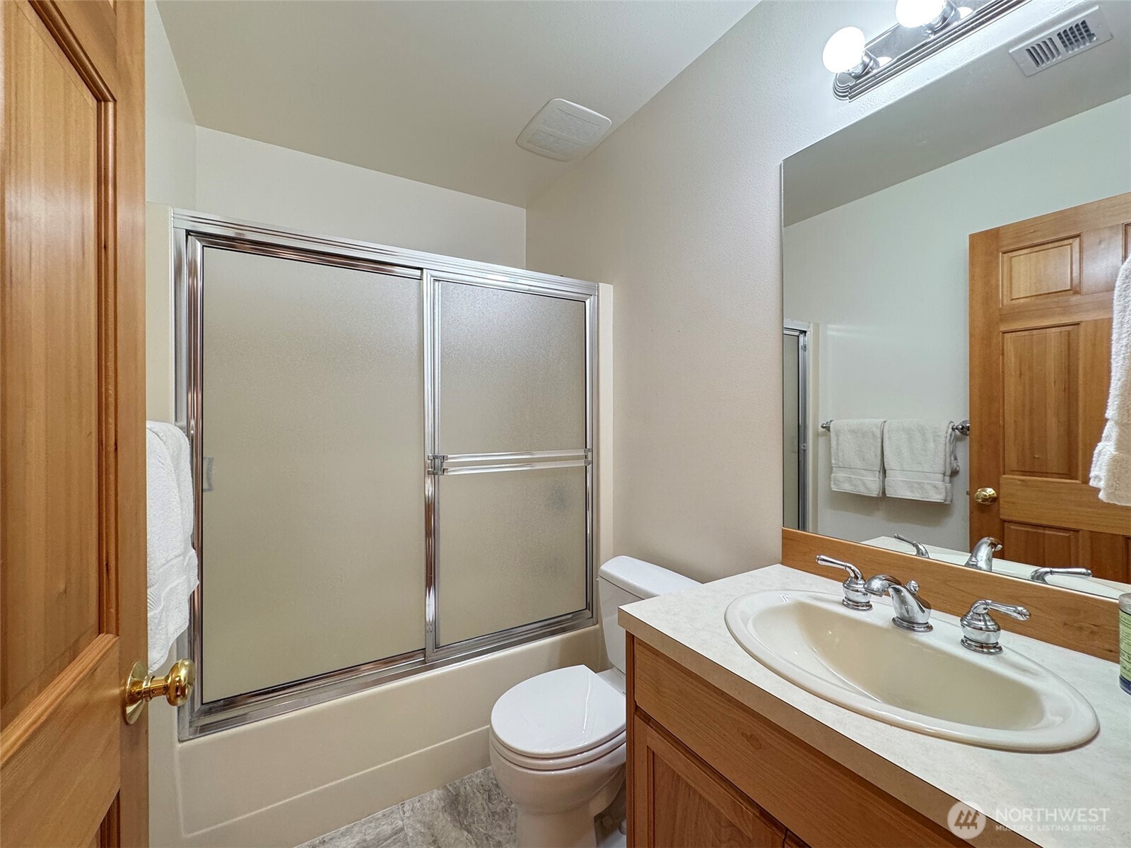 412 Doe Run Road Sequim, WA 98382 - Photo 34 of 40 a bathroom with a sink toilet and shower