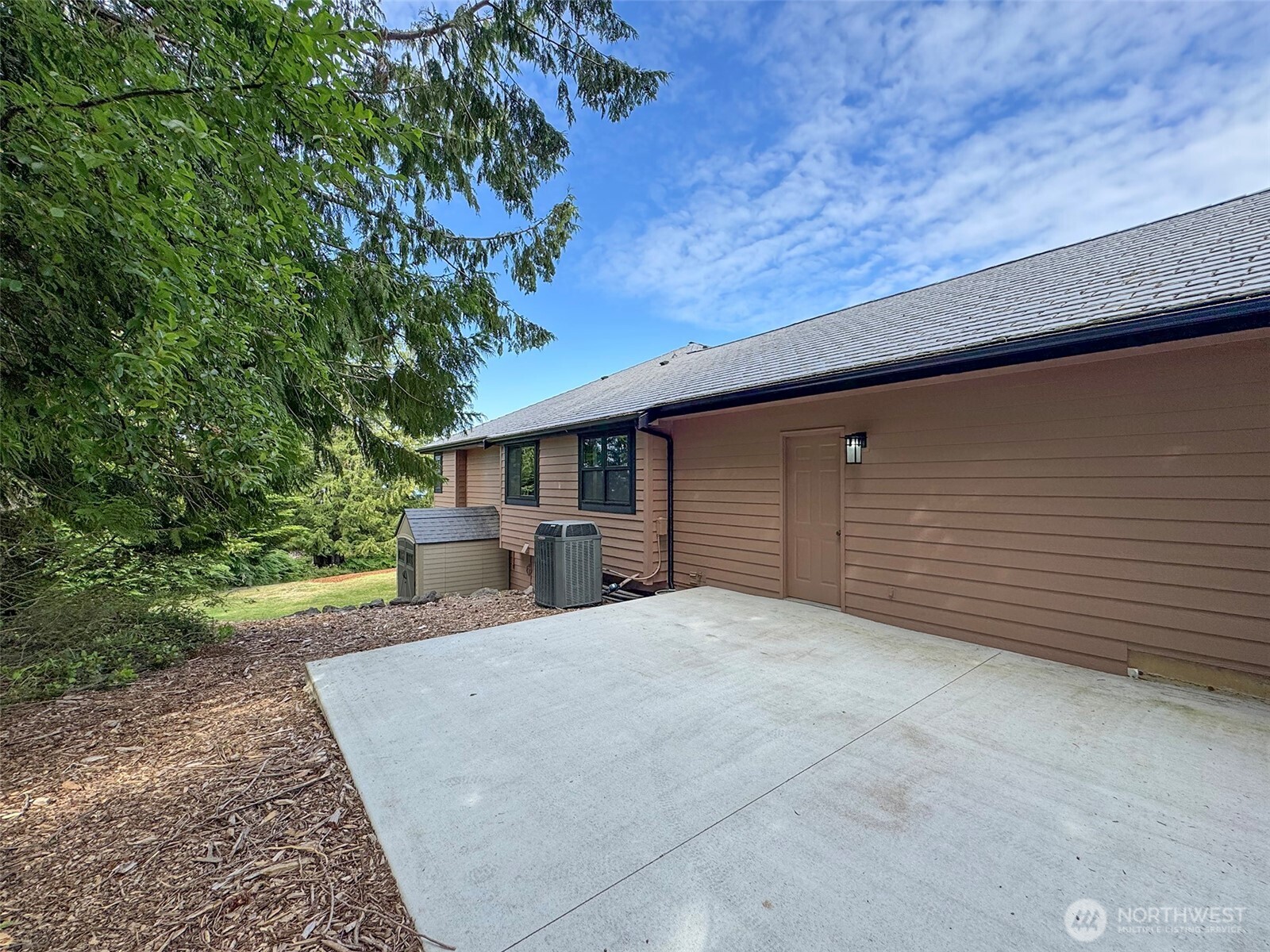 412 Doe Run Road Sequim, WA 98382 - Photo 39 of 40 a view of a house with a yard and tree
