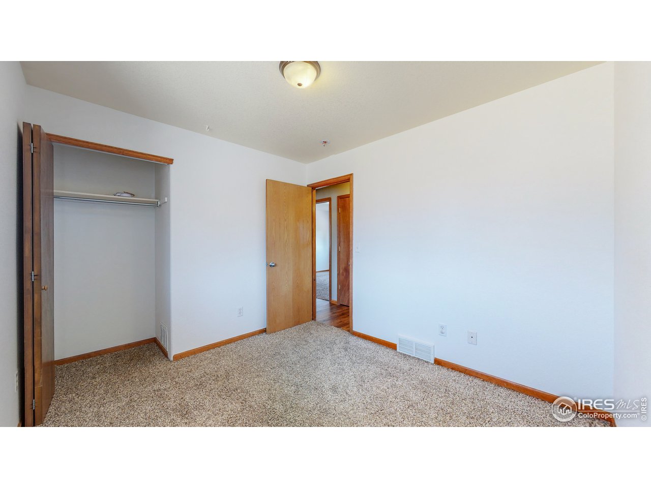 675 East 4th St Road Eaton, CO 80615 - Photo 12 of 32 Second Bedroom and Closet