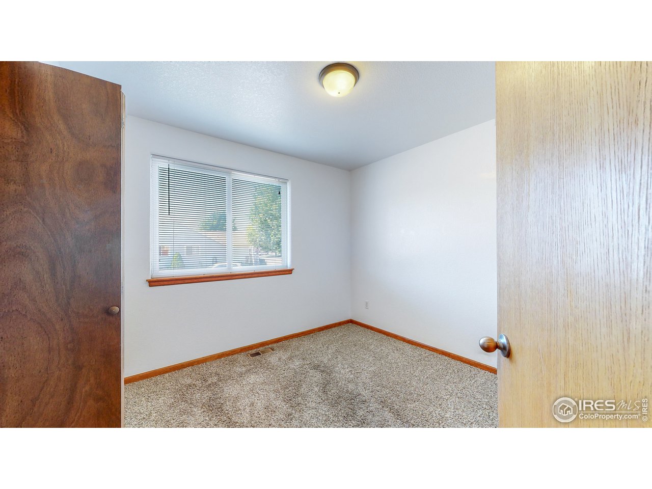 675 East 4th St Road Eaton, CO 80615 - Photo 15 of 32 Third Bedroom