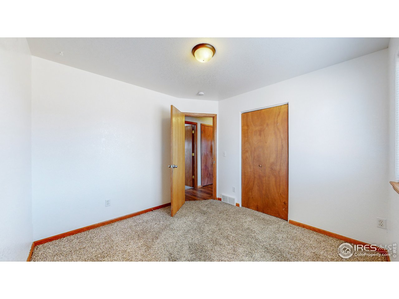 675 East 4th St Road Eaton, CO 80615 - Photo 16 of 32 Third Bedroom and Closet