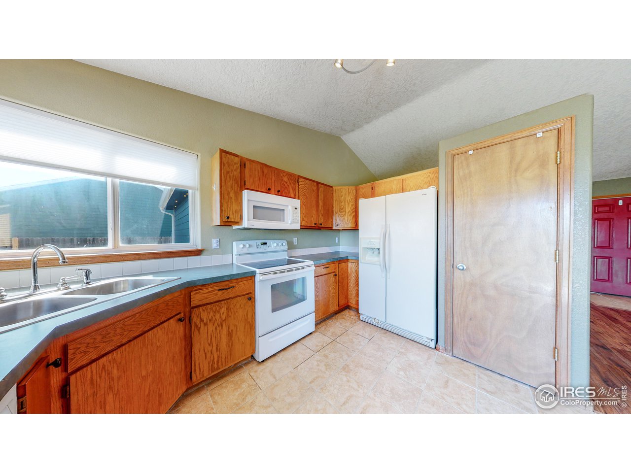 675 East 4th St Road Eaton, CO 80615 - Photo 4 of 32 Kitchen and Pantry