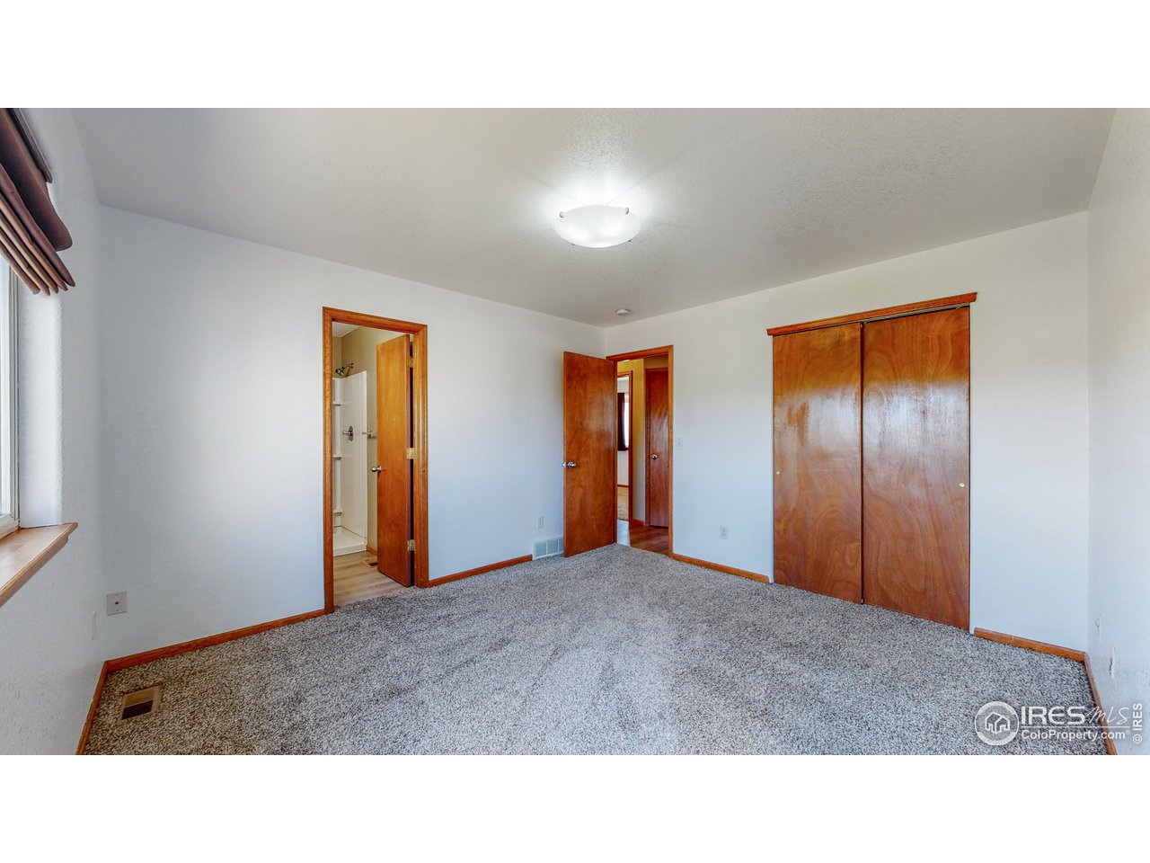 675 East 4th St Road Eaton, CO 80615 - Photo 8 of 32 Master Bedroom and Closet