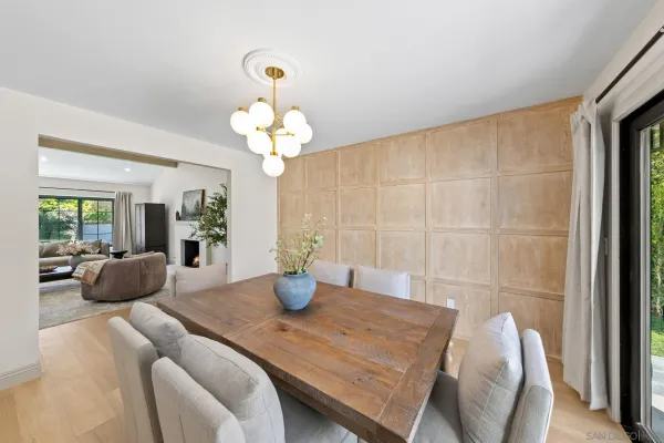 a kitchen with a table and chairs in it