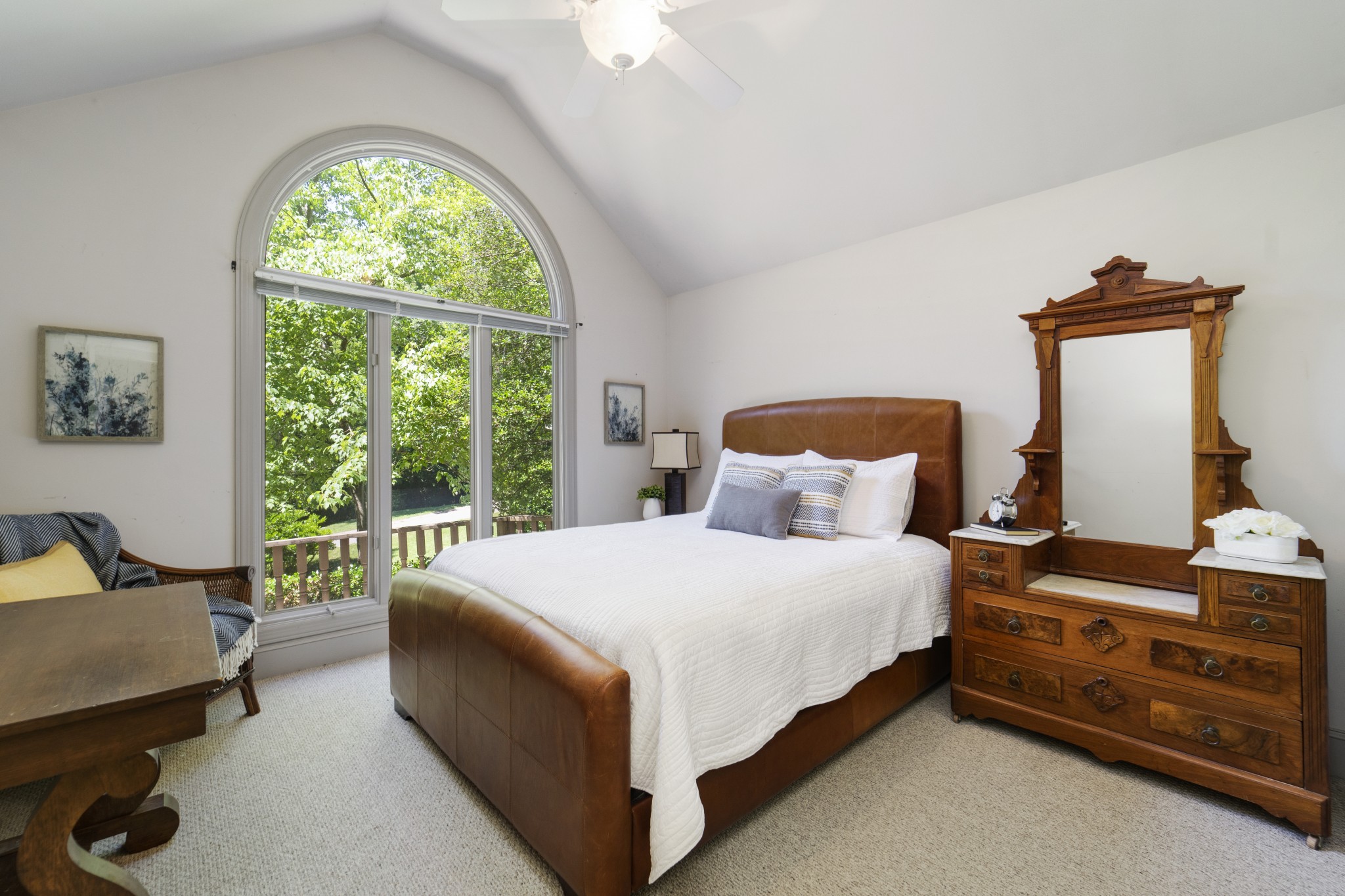 166 Hicks Road Nashville, TN 37221 - Photo 11 of 43 a large bed sitting in a bedroom next to a window