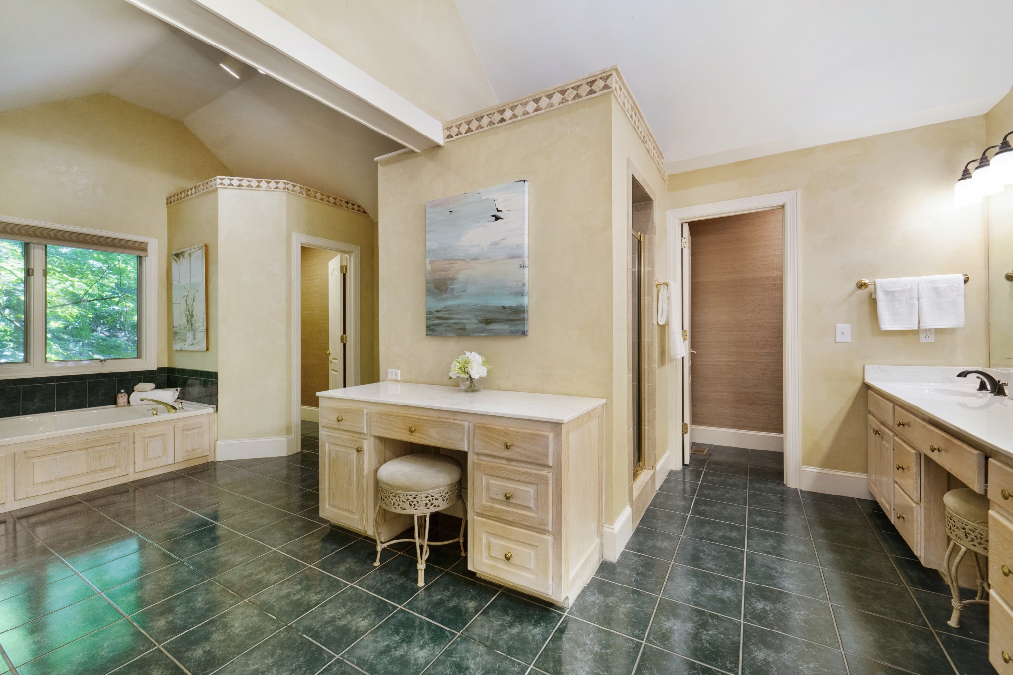166 Hicks Road Nashville, TN 37221 - Photo 24 of 43 a spacious bathroom with a tub sink and mirror