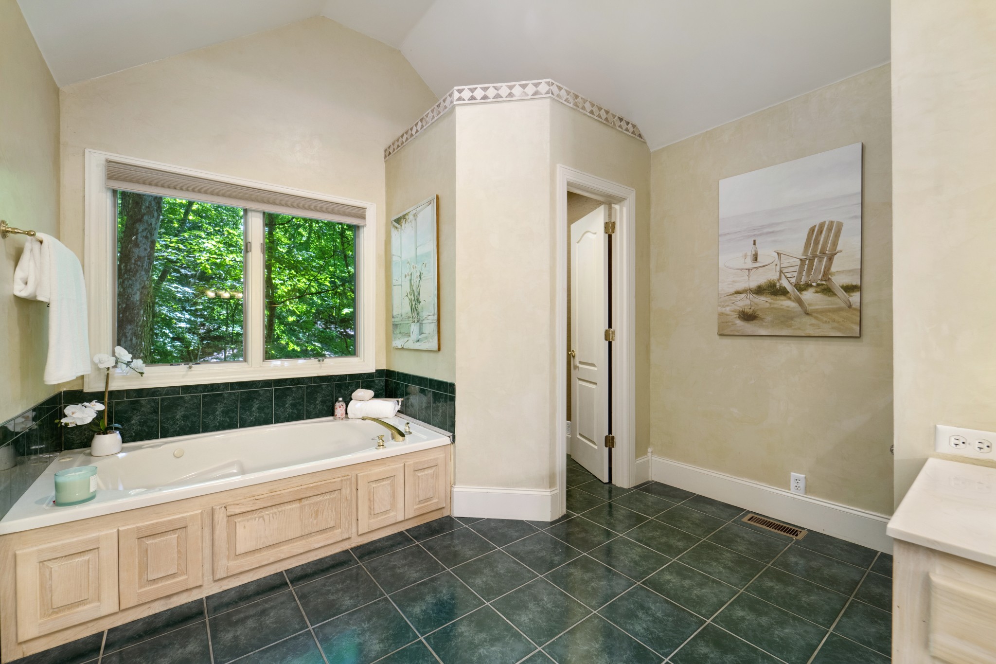 166 Hicks Road Nashville, TN 37221 - Photo 26 of 43 a spacious bathroom with a tub a window and the shower