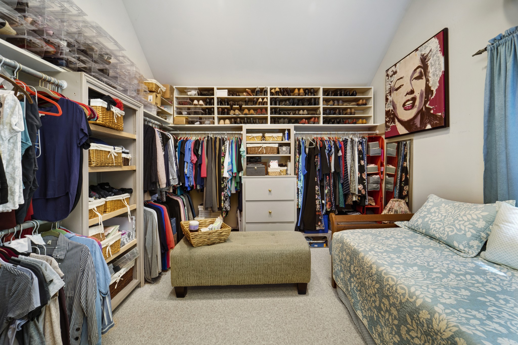 166 Hicks Road Nashville, TN 37221 - Photo 28 of 43 a view of walk in closet with clothes and shoes