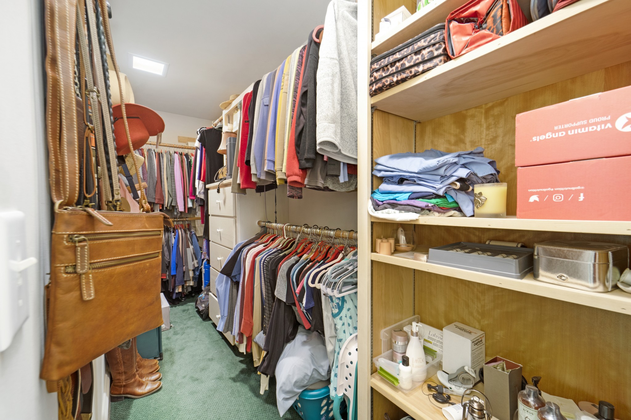 166 Hicks Road Nashville, TN 37221 - Photo 29 of 43 a view of walk in closet with clothes and shoes