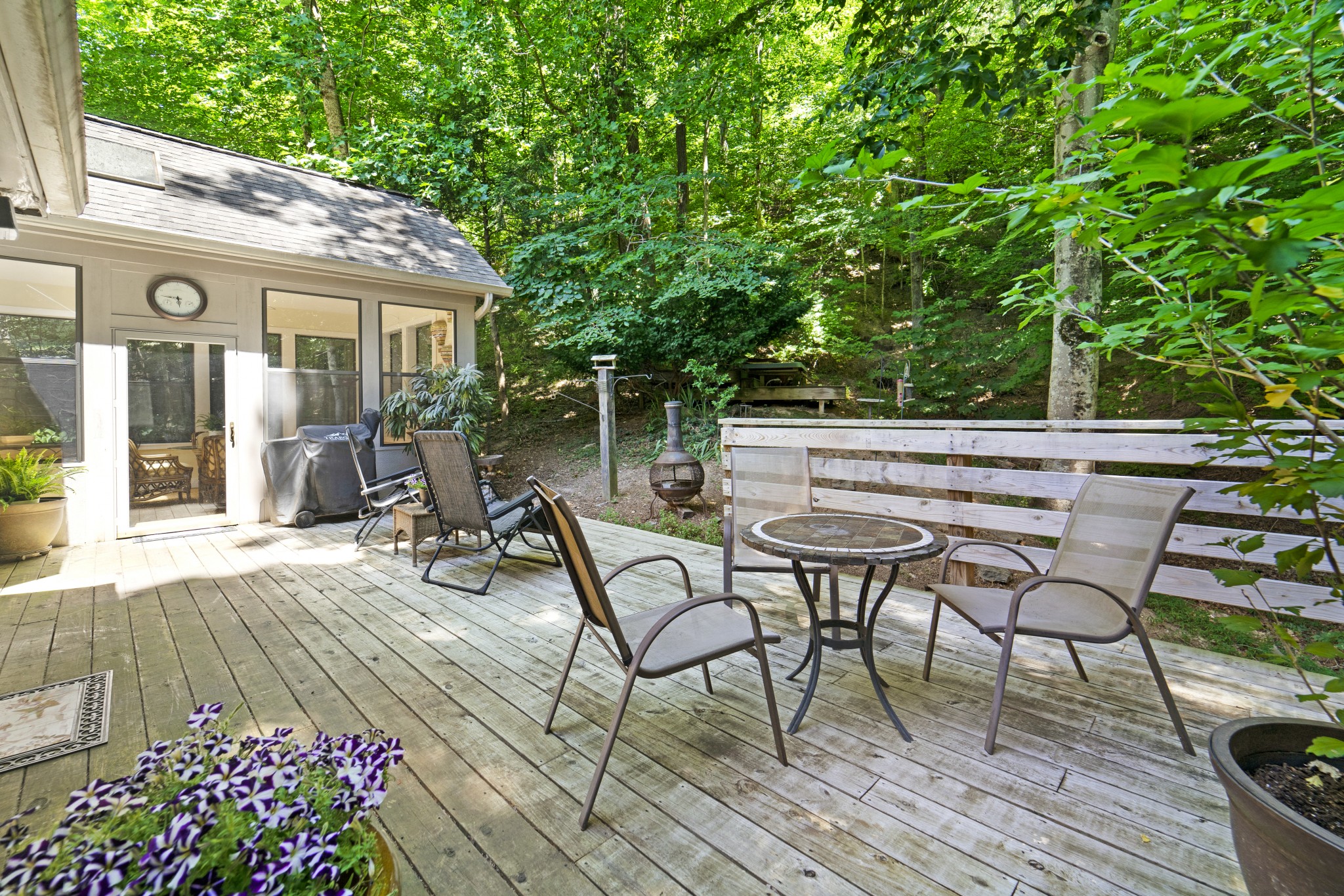 166 Hicks Road Nashville, TN 37221 - Photo 31 of 43 a view of a patio with table and chairs and potted plants