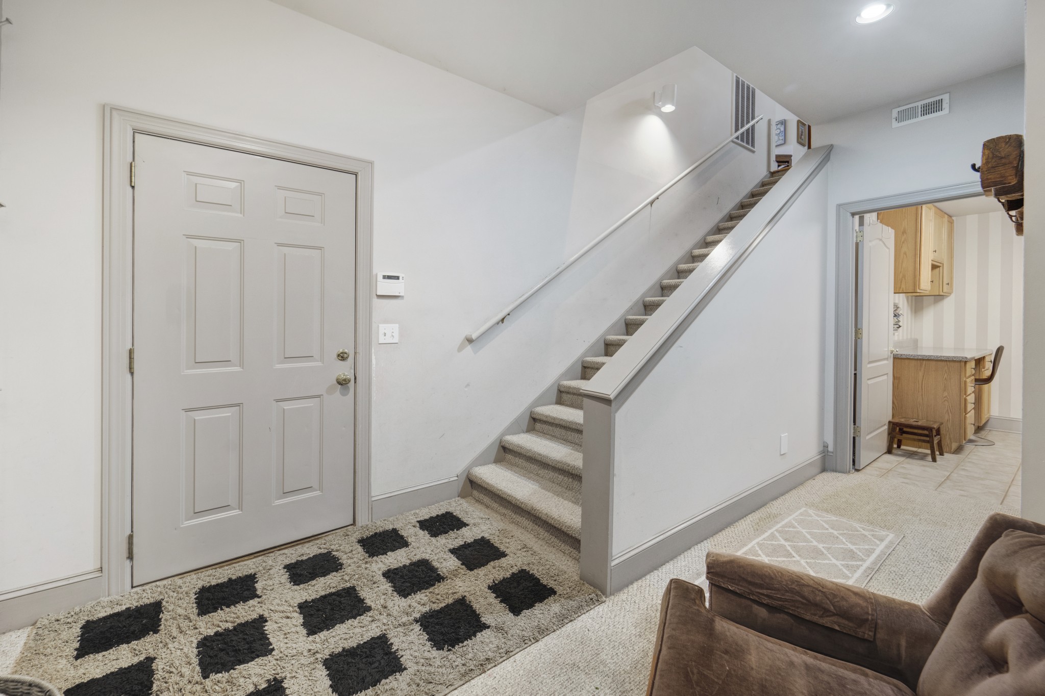 166 Hicks Road Nashville, TN 37221 - Photo 33 of 43 a view of a hallway with furniture and stairs