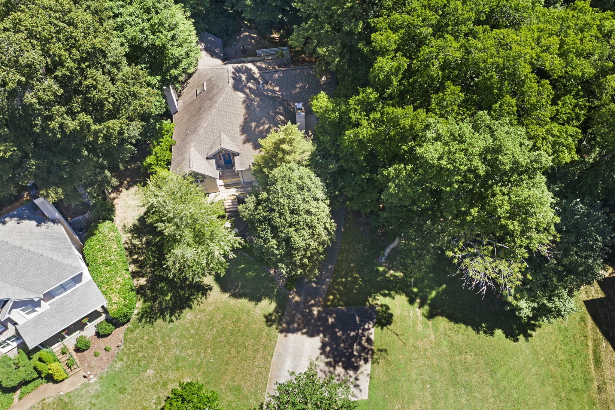 166 Hicks Road Nashville, TN 37221 - Photo 41 of 43 an aerial view of a residential houses with yard and green space