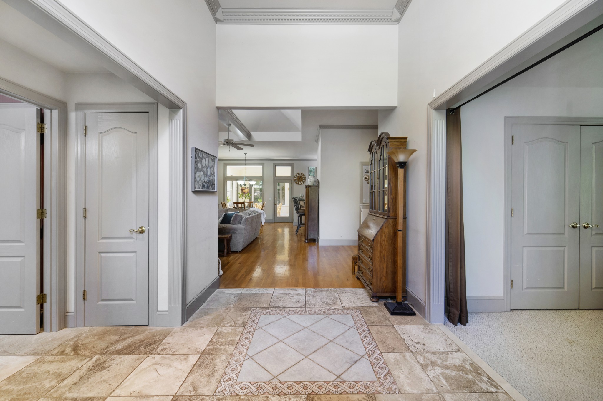 166 Hicks Road Nashville, TN 37221 - Photo 7 of 43 a view of a hallway with wooden floor and living room
