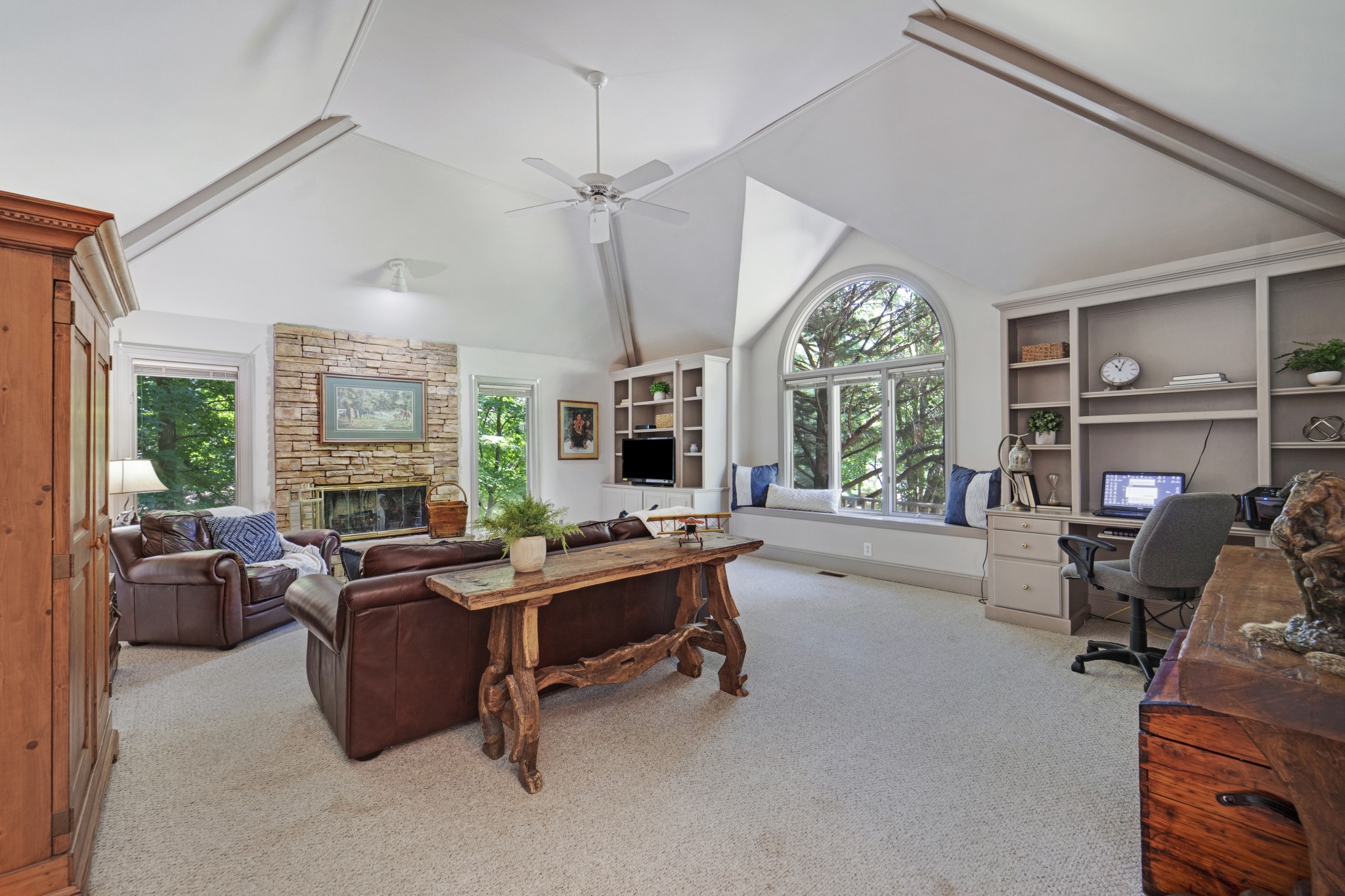 166 Hicks Road Nashville, TN 37221 - Photo 8 of 43 a view of a livingroom with workspace and windows