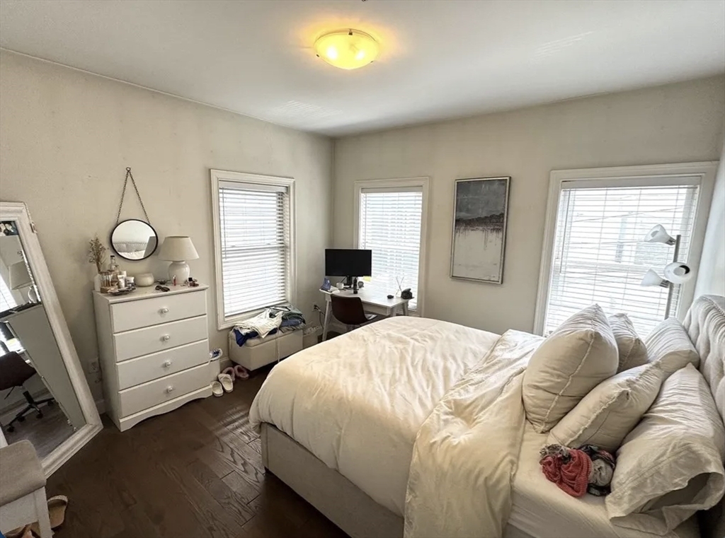 7 Loring Street, Unit 2 Boston, MA 02127 - Photo 4 of 10 a bedroom with a bed and window