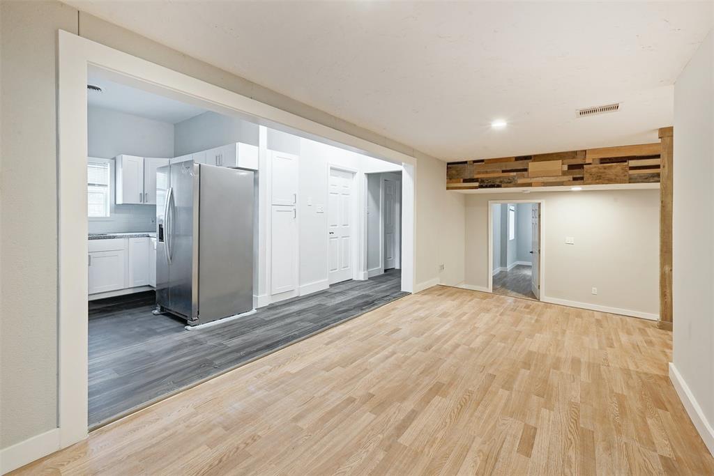 2511 San Gabriel Street Austin, TX 78705 - Photo 2 of 25 a view of empty room with wooden floor