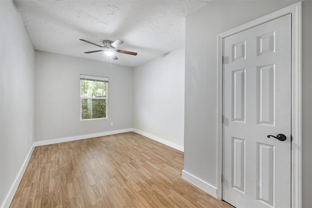 2511 San Gabriel Street Austin, TX 78705 - Photo 24 of 25 wooden floor in an empty room with a window