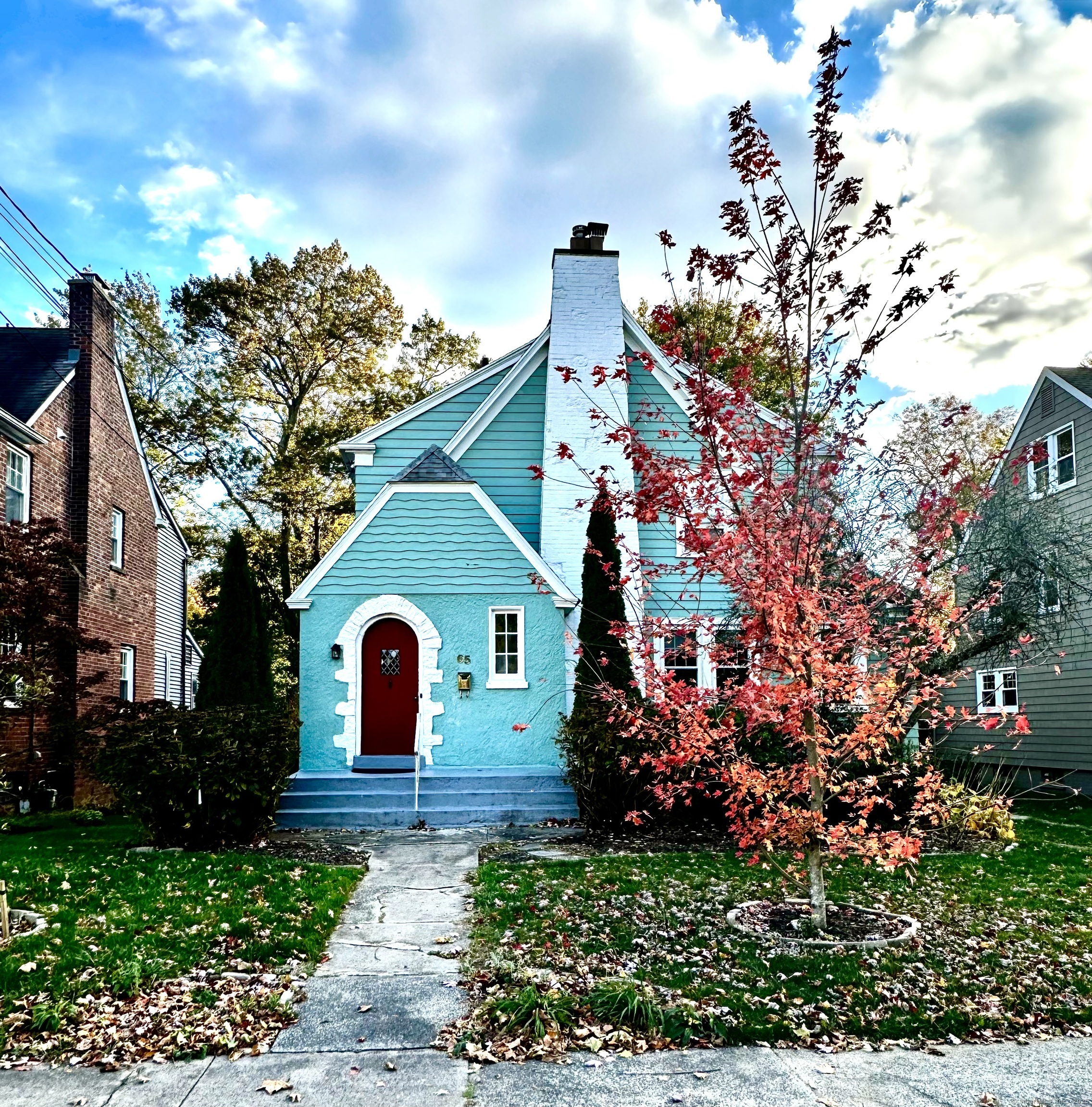 a front view of a house with a yard