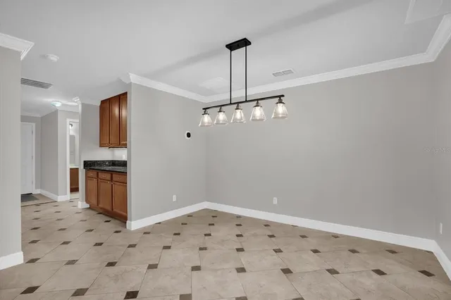 a view of a livingroom with wooden floor
