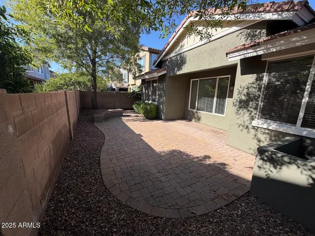 a view of a house with a patio