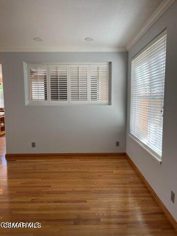 3906 Prato Court Moorpark, CA 93021 - Photo 11 of 51 a view of an empty room with wooden floor and a window