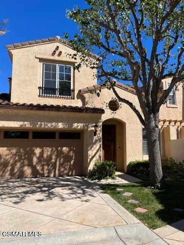 3906 Prato Court Moorpark, CA 93021 - Photo 2 of 51 a front view of a house with garden