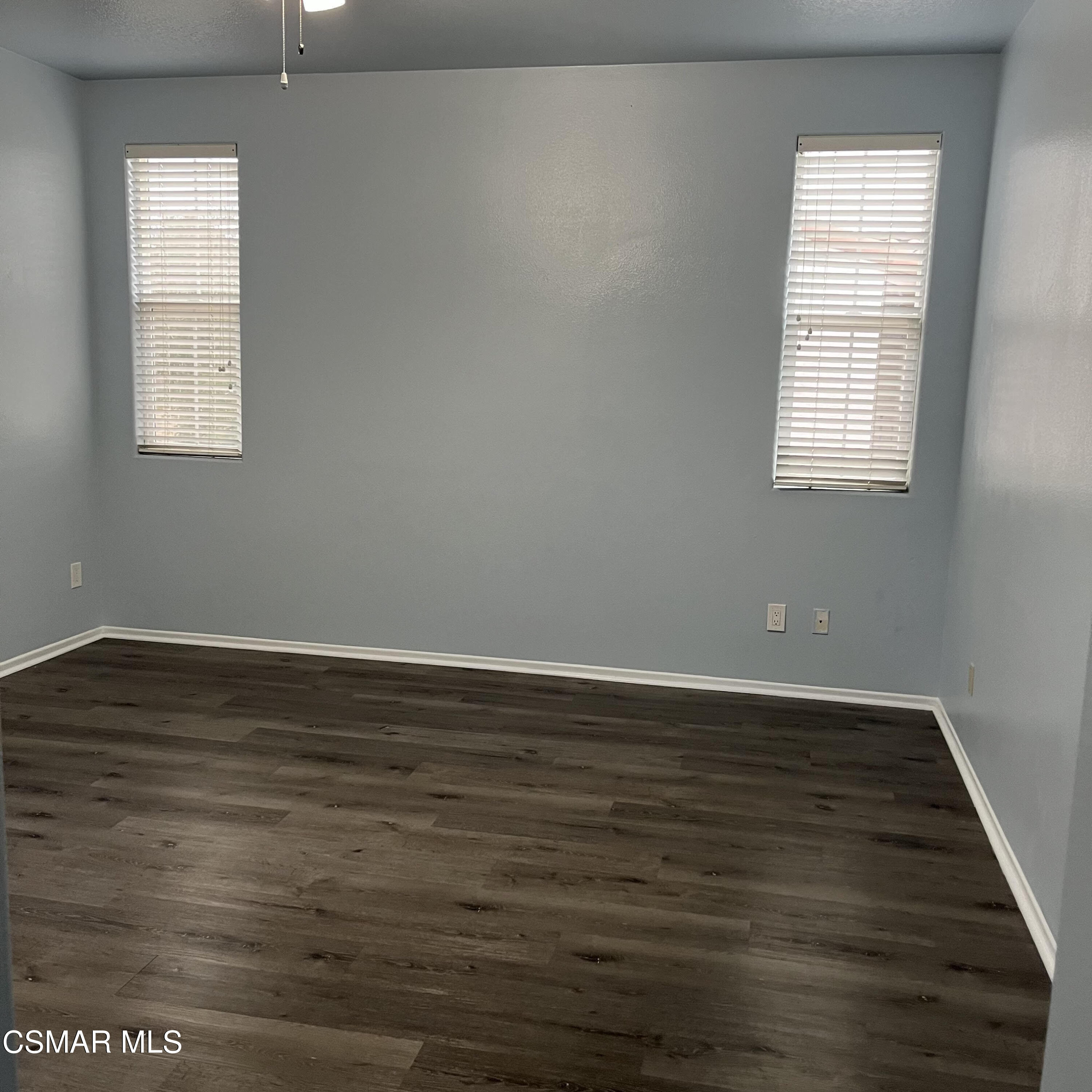 3906 Prato Court Moorpark, CA 93021 - Photo 32 of 51 an empty room with wooden floor and windows
